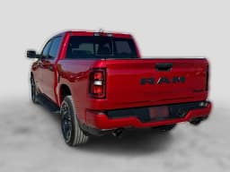 Ram 1500 Express 4x4 Crew Cab 5'7" Box 2026 — side view