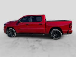 Ram 1500 Express 4x4 Crew Cab 5'7" Box 2026 — side view