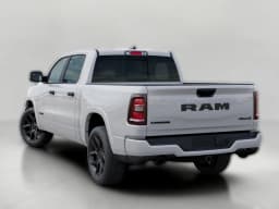 Ram 1500 Laramie 4x4 Crew Cab 5'7" Box 2026 — side view