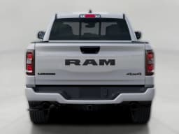 Ram 1500 Laramie 4x4 Crew Cab 5'7" Box 2026 — side view