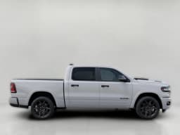 Ram 1500 Laramie 4x4 Crew Cab 5'7" Box 2026 — side view