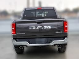 Ram 1500 Laramie 4x4 Crew Cab 5'7" Box 2026 — side view