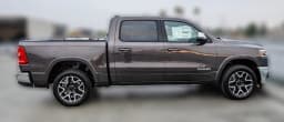 Ram 1500 Laramie 4x4 Crew Cab 5'7" Box 2026 — side view