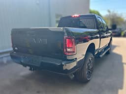 Ram 2500 Black Express 4x4 Crew Cab 6'4" Box 2026 — side view