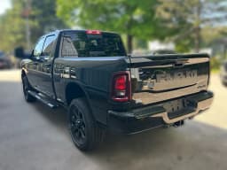 Ram 2500 Black Express 4x4 Crew Cab 6'4" Box 2026 — side view