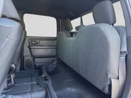 Ram 2500 Black Express 4x4 Crew Cab 6'4" Box 2027 — side view