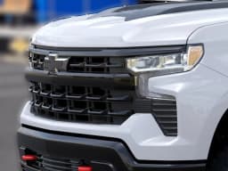 Chevrolet Silverado 1500 LT Trail Boss 4WD Crew Cab 147" 2026 — side view