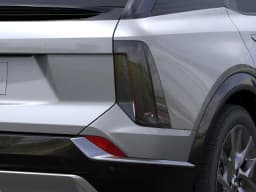 Cadillac OPTIQ Luxury 4dr 2027 — side view