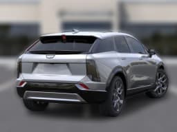 Cadillac OPTIQ Luxury 4dr 2027 — side view