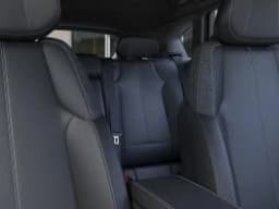 Cadillac OPTIQ Luxury 4dr 2027 — side view