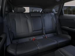 Cadillac OPTIQ Luxury 4dr 2027 — side view