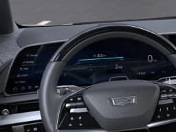 Cadillac OPTIQ Luxury 4dr 2027 — side view