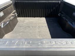 Toyota Tacoma 4WD TRD Pro Hybrid Double Cab 5' Bed AT (Natl) 2026 — side view