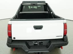 Toyota Tacoma 4WD Trailhunter Hybrid Double Cab 5' Bed AT (Natl) 2026 — side view