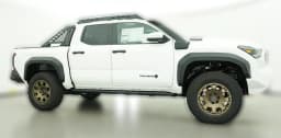 Toyota Tacoma 4WD Trailhunter Hybrid Double Cab 5' Bed AT (Natl) 2026 — side view