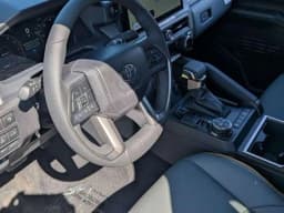 Toyota Tacoma 4WD Trailhunter Hybrid Double Cab 6' Bed AT (GS) 2026 — side view
