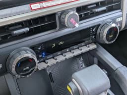 Toyota Tacoma 4WD Trailhunter Hybrid Double Cab 6' Bed AT (GS) 2026 — side view