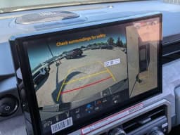 Toyota Tacoma 4WD Trailhunter Hybrid Double Cab 6' Bed AT (GS) 2026 — side view