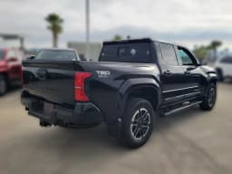 Toyota Tacoma 4WD TRD Sport Double Cab 5' Bed MT (Natl) 2026 — side view