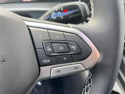 Volkswagen Tiguan SE 4MOTION 2026 — side view