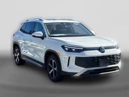 Volkswagen Tiguan SE 4MOTION 2026 — side view