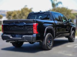 Toyota Tundra 4WD TRD Pro Hybrid CrewMax 5.5' Bed (Natl) 2026 — side view