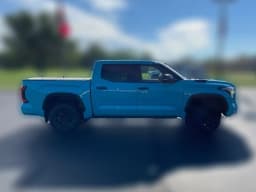 Toyota Tundra 4WD TRD Pro Hybrid CrewMax 5.5' Bed (Natl) 2026 — side view