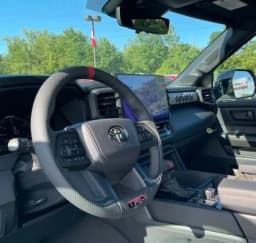 Toyota Tundra 4WD TRD Pro Hybrid CrewMax 5.5' Bed (Natl) 2026 — side view
