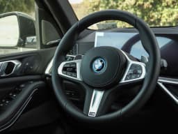 BMW X5 xDrive50e Plug-In Hybrid 2026 — side view