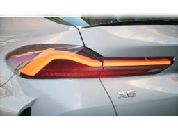 BMW X6 M60i Sports Activity Coupe 2026 — side view