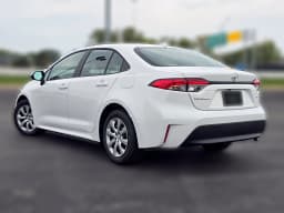 Toyota Corolla LE CVT (Natl) 2026 — side view