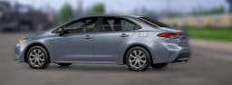 Toyota Corolla LE CVT (Natl) 2026 — side view