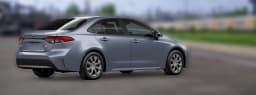 Toyota Corolla LE CVT (Natl) 2026 — side view