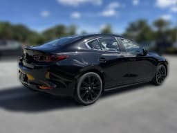 Mazda Mazda3 Sedan 2.5 S Carbon Edition AWD 2026 — side view