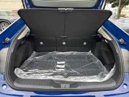 Toyota Prius Plug-In Hybrid SE (Natl) 2027 — side view