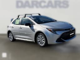 Toyota Corolla Hatchback SE CVT (Natl) 2027 — side view