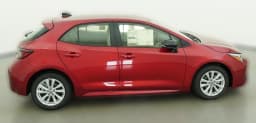 Toyota Corolla Hatchback SE CVT (Natl) 2026 — side view