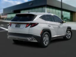 Hyundai Tucson Hybrid SE FWD 2026 — side view