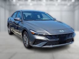 Hyundai Elantra Hybrid Blue Sedan 2026 — side view