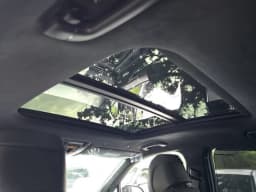 Genesis GV80 Coupe 3.5T e-SC Prestige Black AWD 2027 — side view