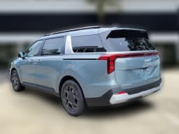 Kia Carnival Hybrid EX FWD 2027 — side view
