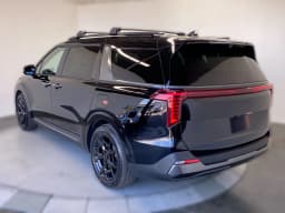 Kia Carnival SX Prestige FWD 2026 — side view