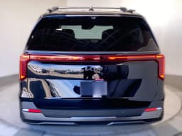 Kia Carnival SX Prestige FWD 2026 — side view