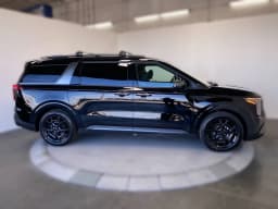 Kia Carnival SX Prestige FWD 2026 — side view