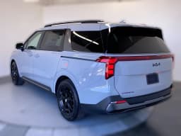 Kia Carnival SX FWD 2027 — side view