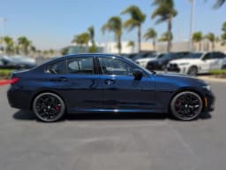 BMW 3 Series 330i Sedan 2026 — side view