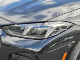 BMW 4 Series 430i xDrive Convertible 2027 — side view