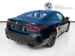BMW 4 Series M440i Coupe 2027 — side view