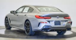 BMW 8 Series M850i Gran Coupe 2026 — side view