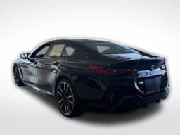 BMW 8 Series M850i Gran Coupe 2026 — side view